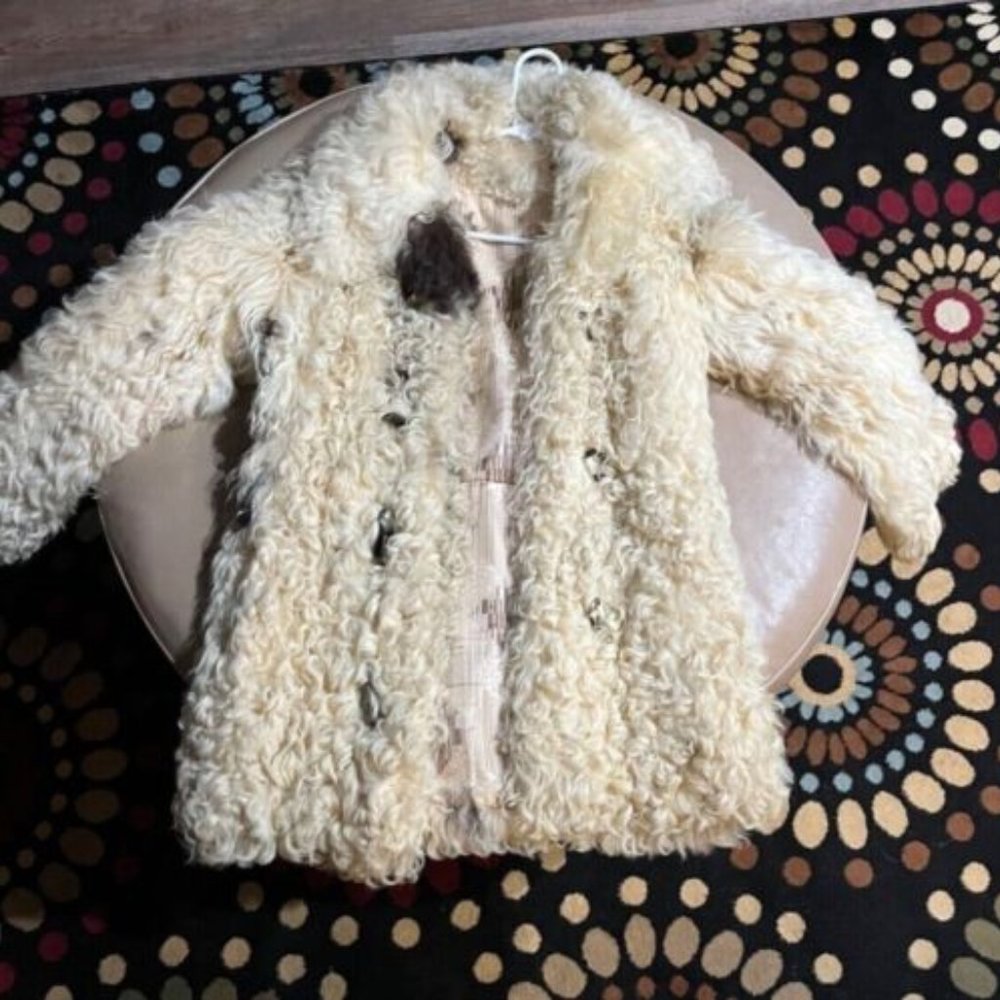 White long curly fur coat